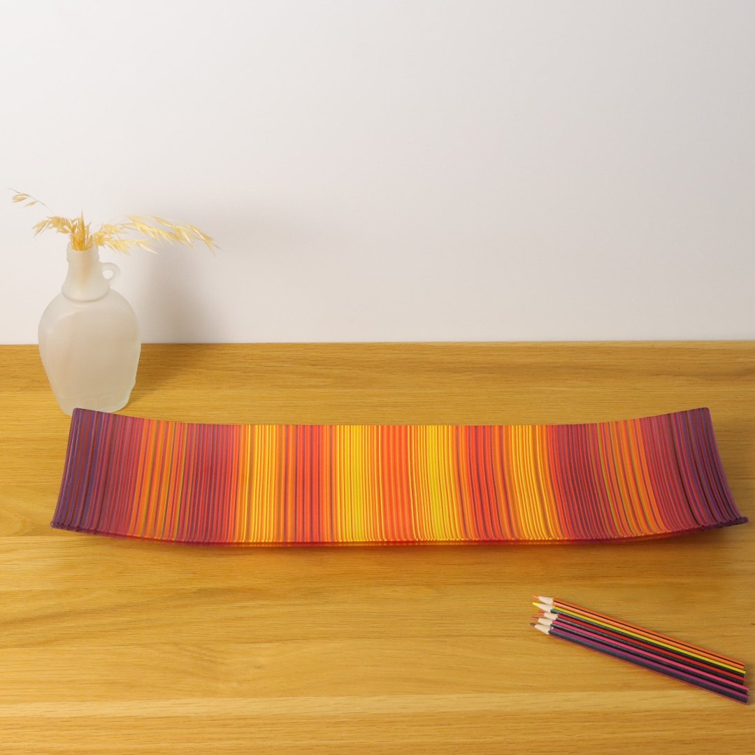 ColourWave Glass - Evening Resonance - Fused Glass Striped Plate with gradient of colours from Purple to Yellow, with red and orange in between.
